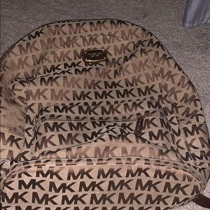 Michael Kors book bag.